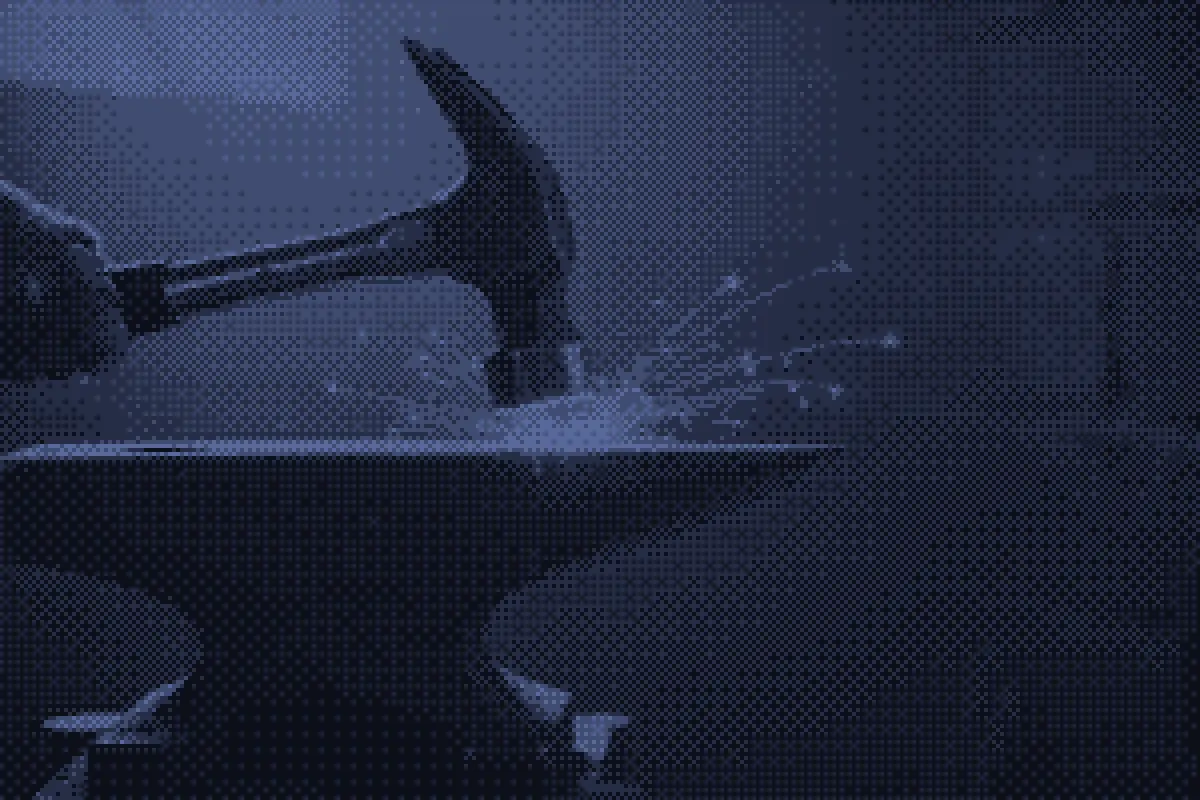 A blue-toned abstract image of tools at work